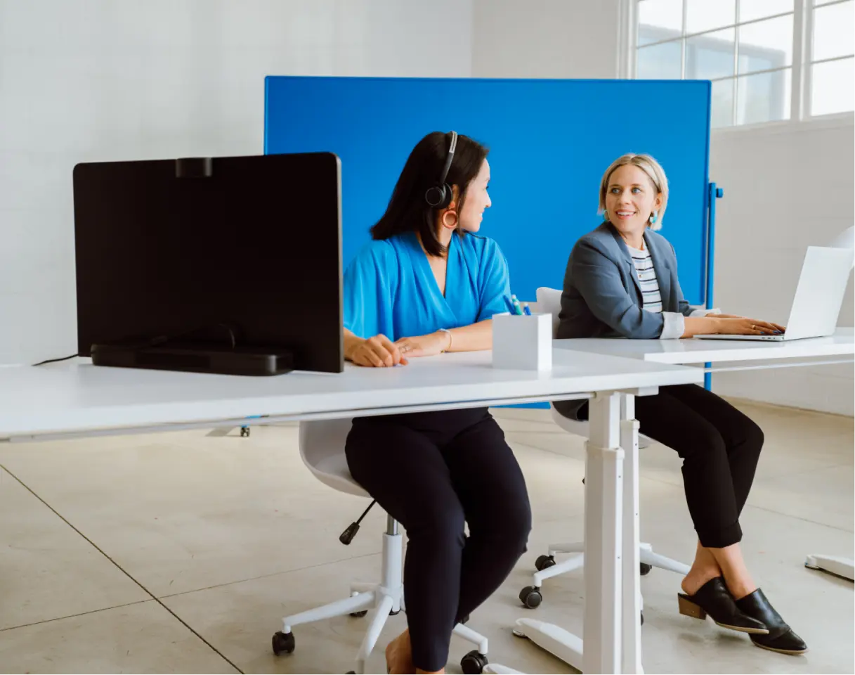 Office workers at open desk