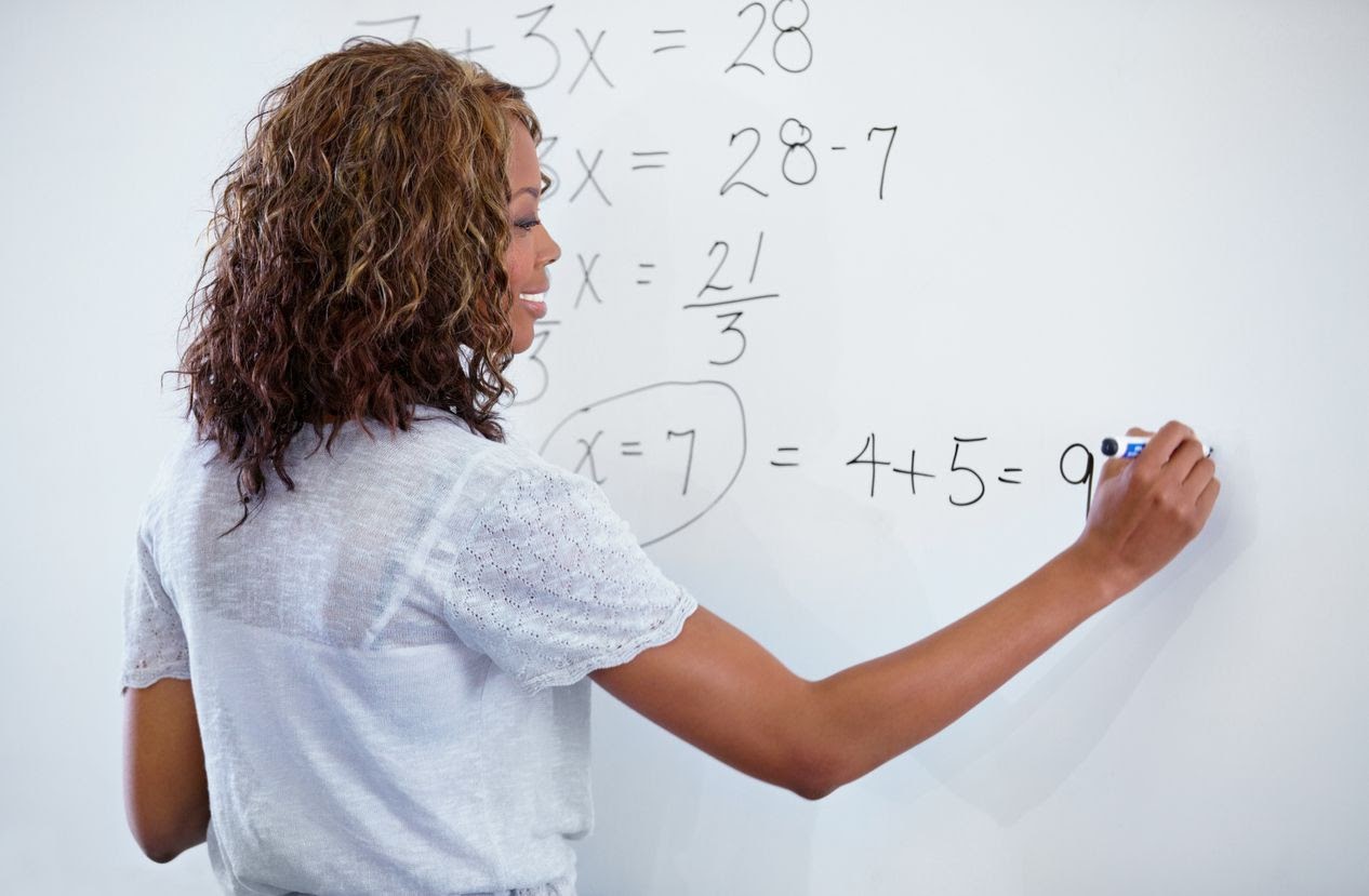 Teacher at whiteboard
