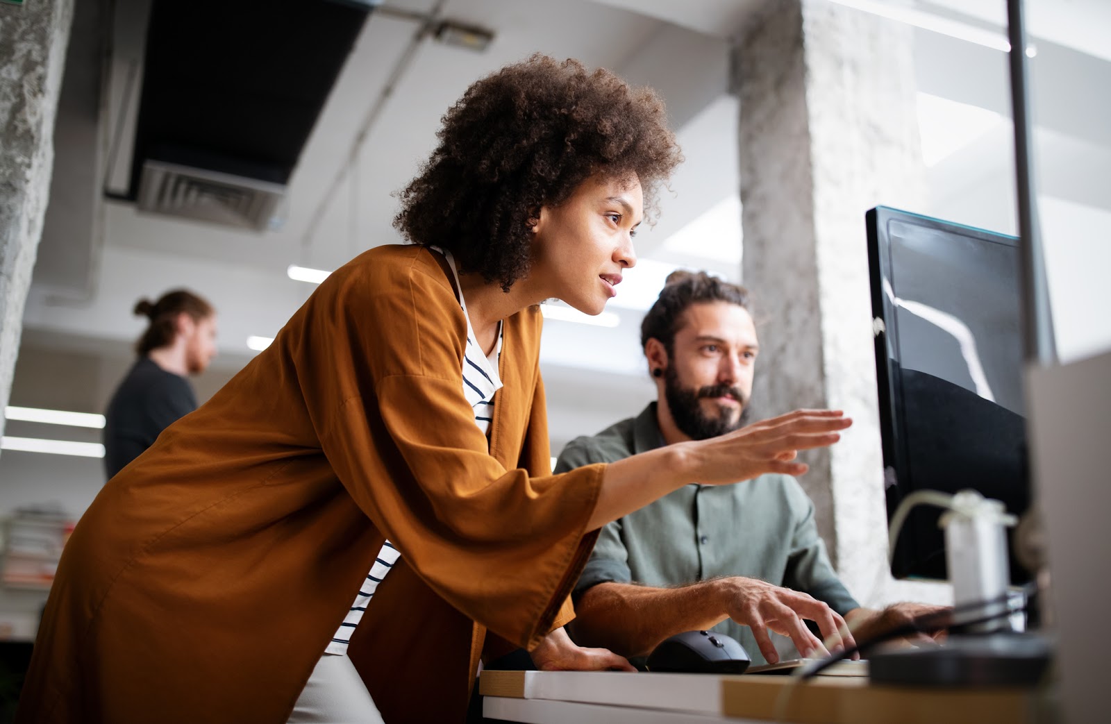 Woman and man at computer