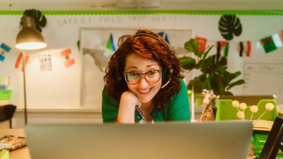 teacher in classroom with virtual kids