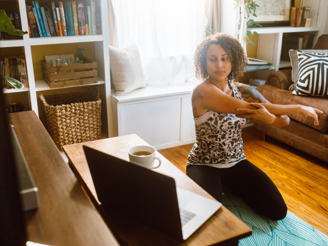 Person doing yoga at home 