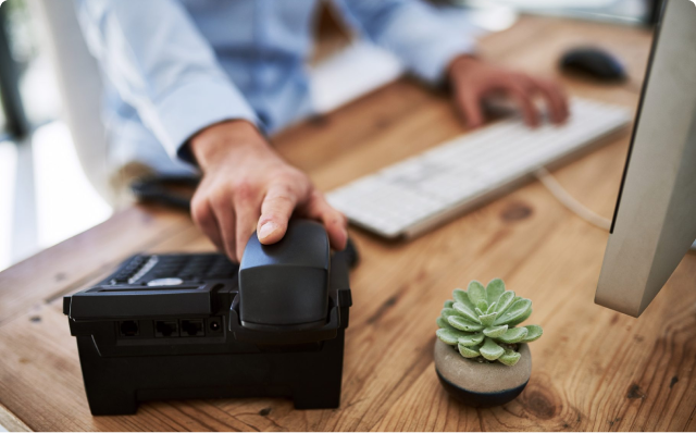 Deskphone on furnished oak