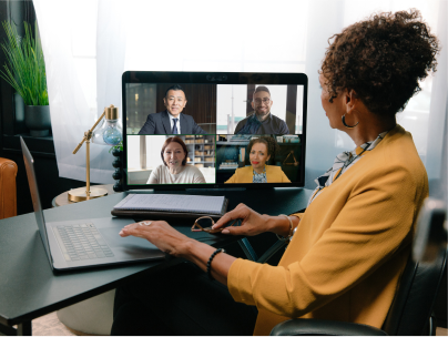 Woman at desk on Zoom