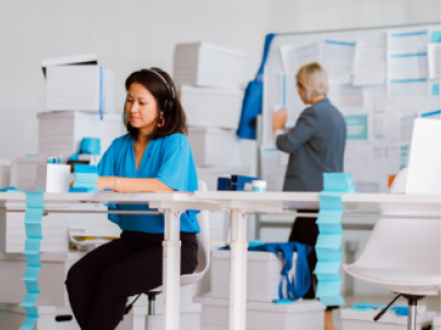 Office desk with posted notes slinky