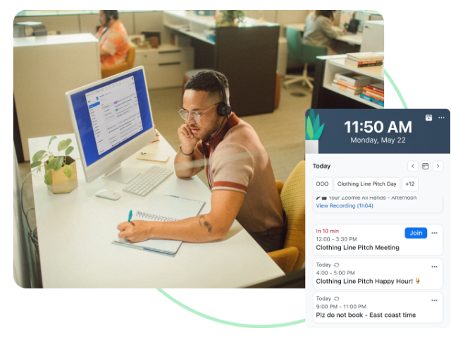 Man at office desk writing