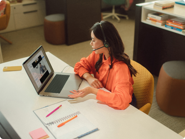 Woman at desk on zoom meetings