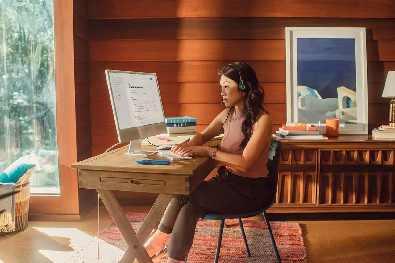 Side by side photos of a professional at work; wearing a headset and working digitally at a computer