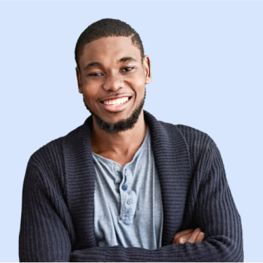 Man smiling with crossed arms