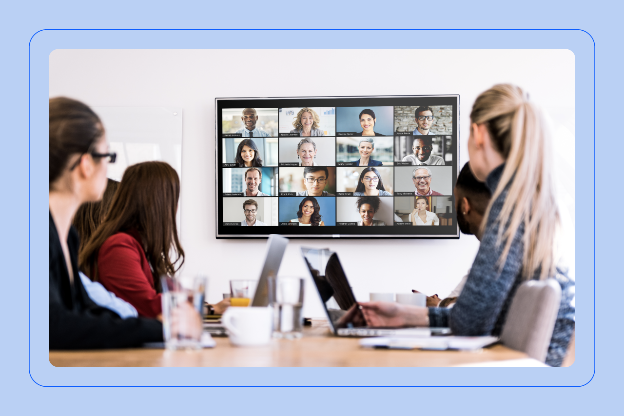 Professionals at their laptops having a video meeting