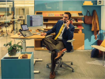 man using desk phone